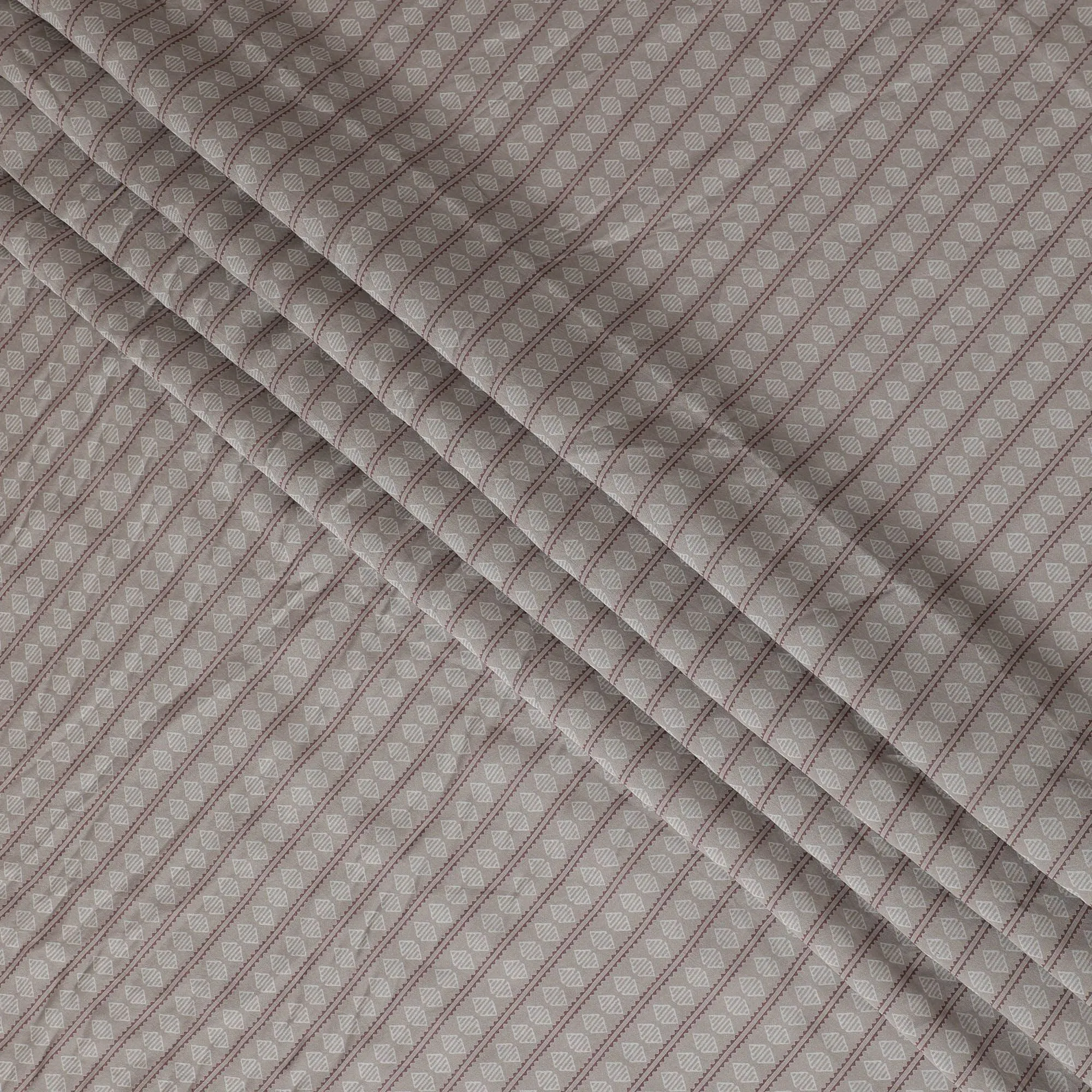 Grey Synthetic blended cotton fabric with beige and brown print in geometric design-D16736